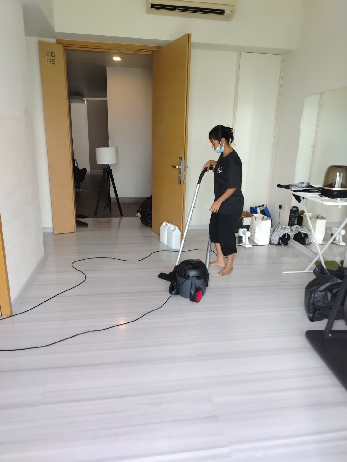 Vacuuming a marble floor