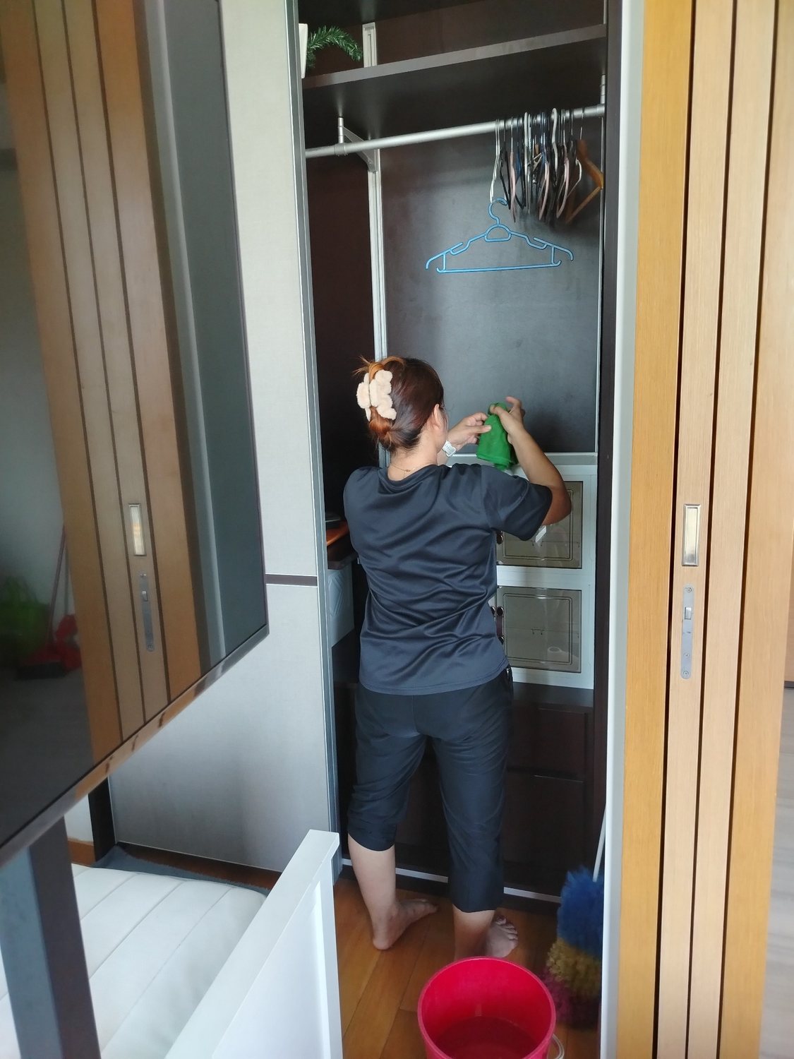 Cleaning inside a wardrobe