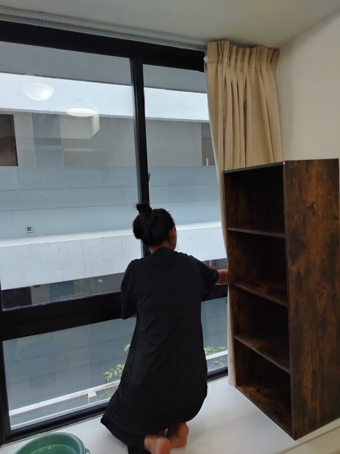 Cleaning a large home window